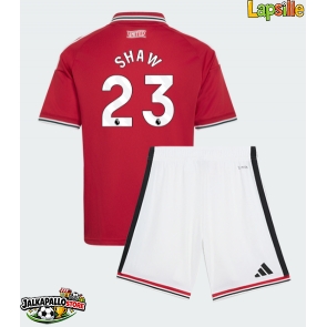 Manchester United Luke Shaw #23 Kotipaita Lapsille 2026-27 Lyhythihainen (+ shortsit)